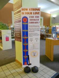 This lobby sign shows the progress of the campaign to increase donations for the library.