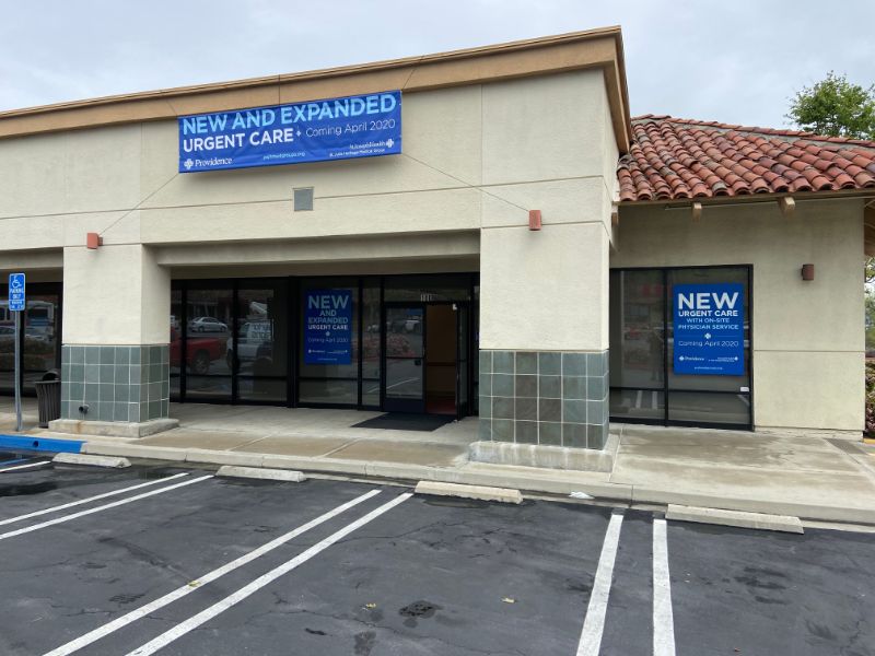 “Coming Soon” banners and window graphics in Anaheim