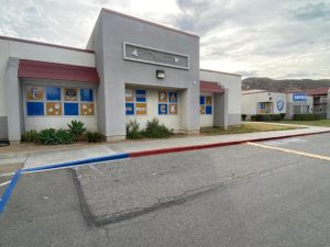 perforated window graphics provide security at schools in orange county, ca